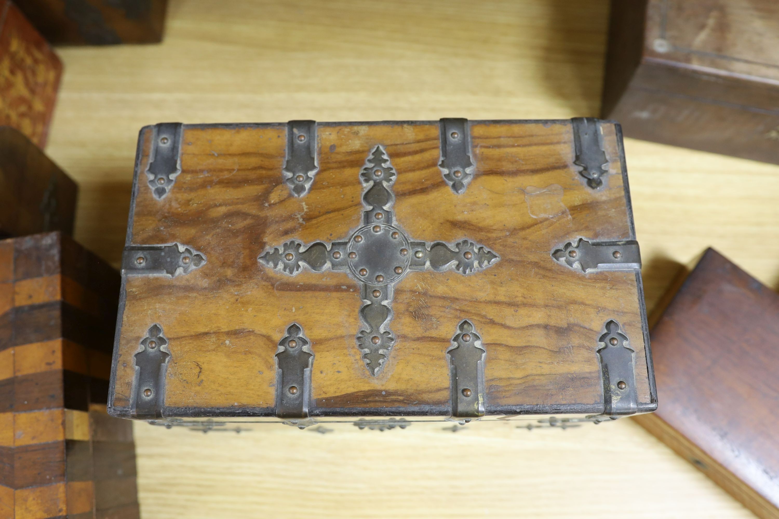 A Victorian Walnut and brass strap mounted tea caddy together with two caskets and five other boxes (8)